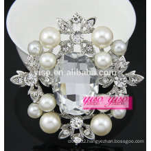 large pearl extra large stone brooch